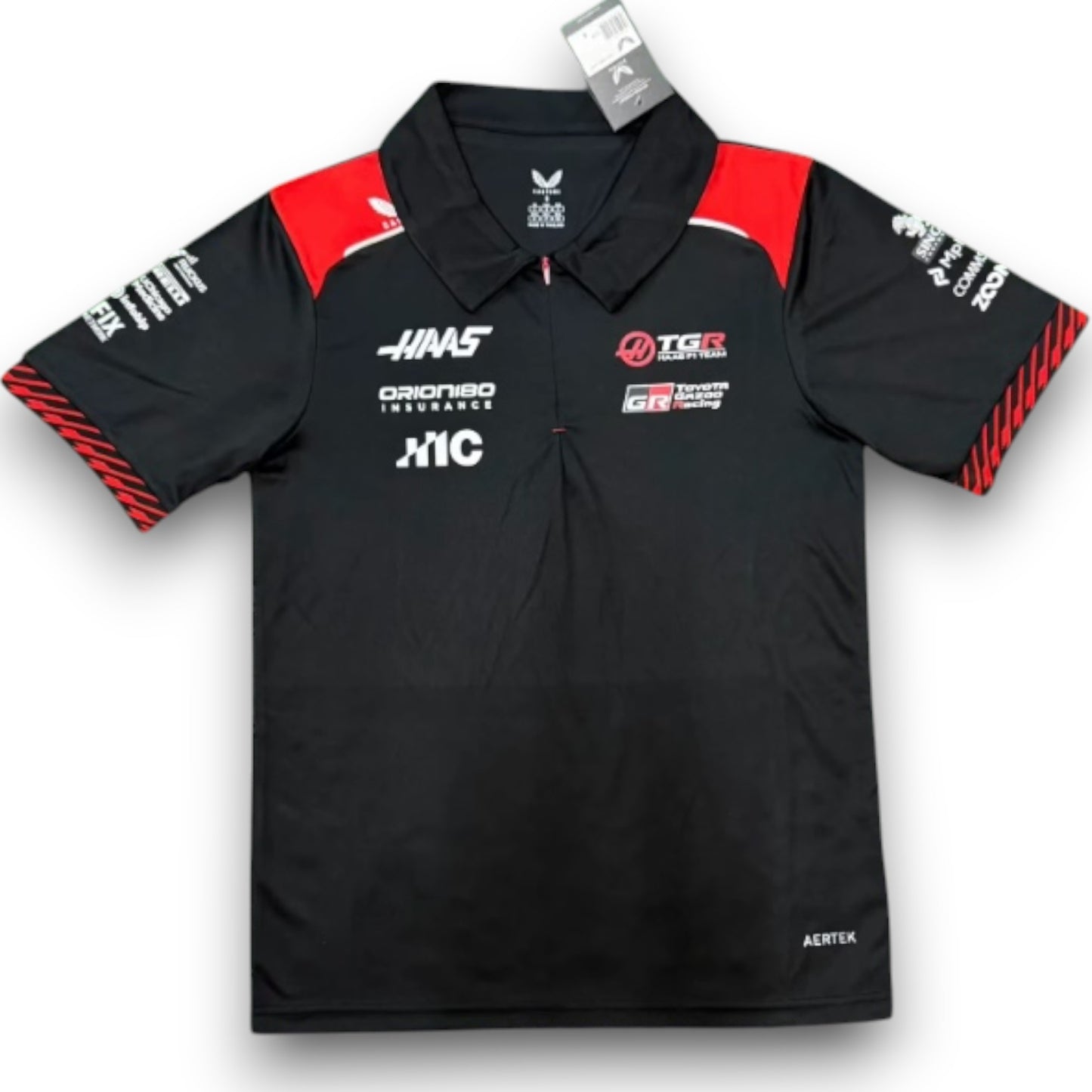 Polo equipo Haas F1 2026